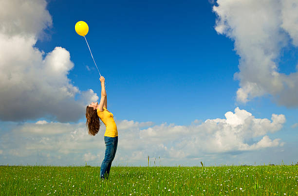 istock Girl with a balloon 153250756