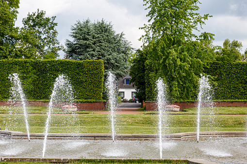Fountain in park in spring