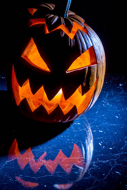 istock Pumpkin with candle lighted for halloween 153253729