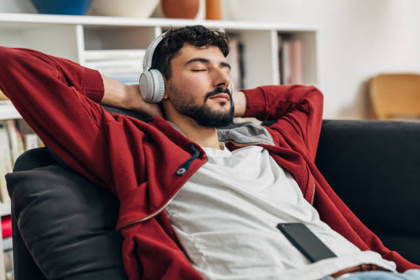 istock young adult man at home 1532559937