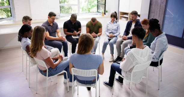istock Christian Group Praying To Jesus 1532564706