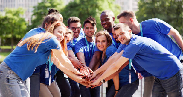istock Volunteer Social Community Teamwork. Volunteering Unity 1532565381