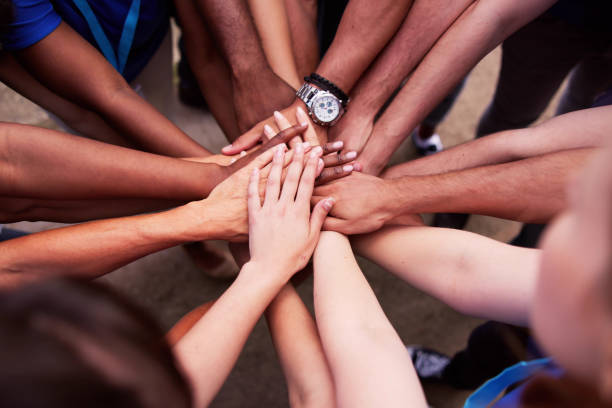 istock Volunteer Social Community Teamwork. Volunteering Unity 1532565815