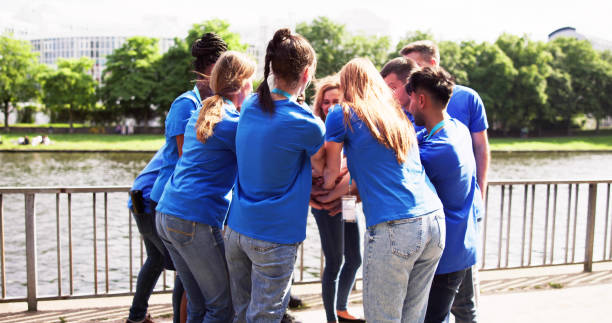 istock Volunteer Social Community Teamwork. Volunteering Unity 1532565822