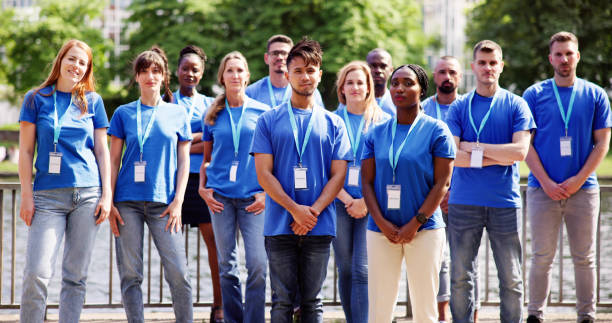istock Volunteer Team In Nature 1532565826