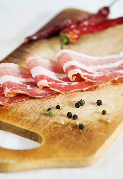 istock Slices of bacon and pepper 153256731