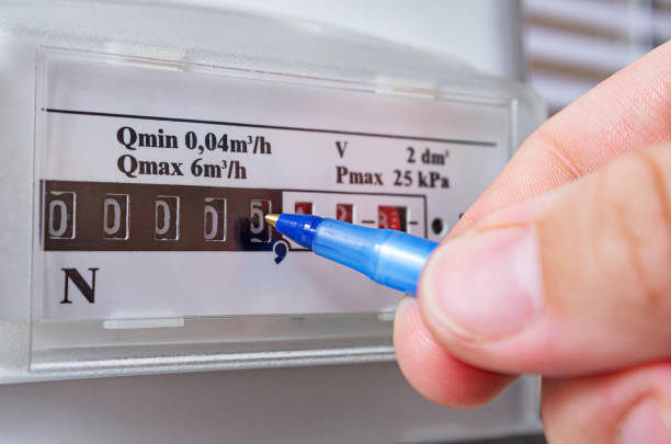 istock Ballpoint pen pointing to the initial gas meter readings. Replacing a new meter with a new one. 1532569578