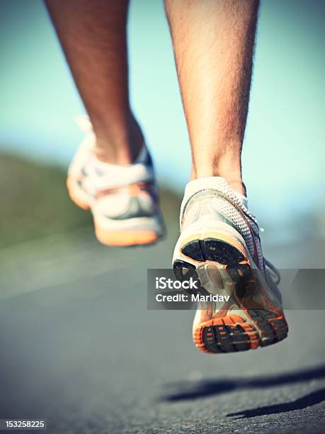 Runnning Shoes On Runner Stock Photo - Download Image Now - Running, Human Foot, Blurred Motion