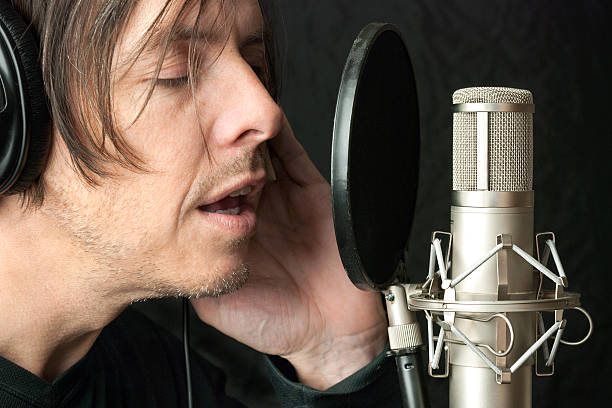 istock Serious Man Records Vocals In Stuio 153258541