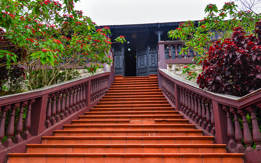 Dalat, Vietnam - Nov 26, 2017. Brick stairs of traditional wooden house in Dalat, Vietnam.