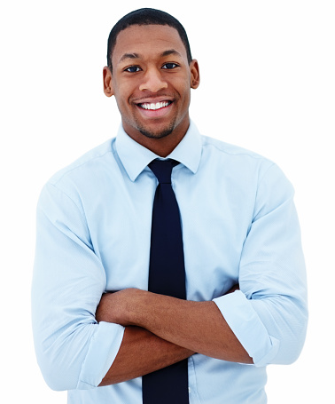 Portrait of a businessman smiling against white background