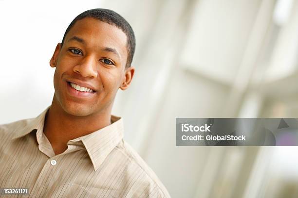 Portrait Of A Young Man Smiling Stock Photo - Download Image Now - 20-24 Years, 20-29 Years, Adult