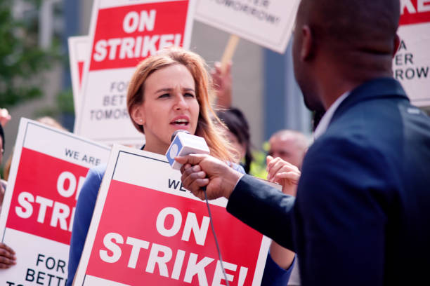 istock Workers Strike Demonstration In City. Labor Union March 1532619036