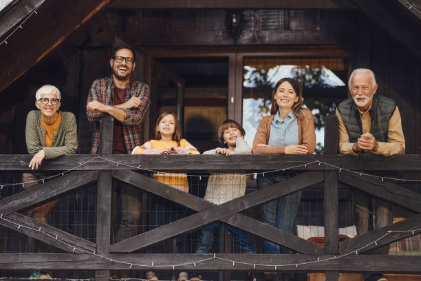 istock Happy multi-generation family on a house terrace. 1532624389