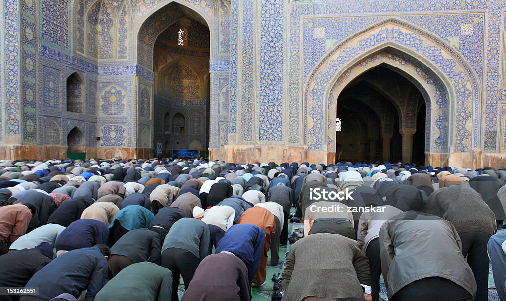 Muslim Friday mass prayer in Iran Muslim Friday mass prayer in Imam Mosque in Isfahan, Iran Islam Stock Photo