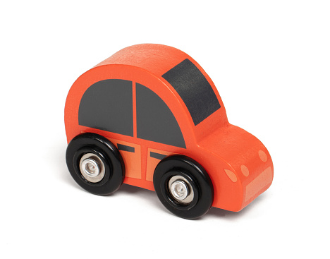 Retro wooden toy car isolated on a white background