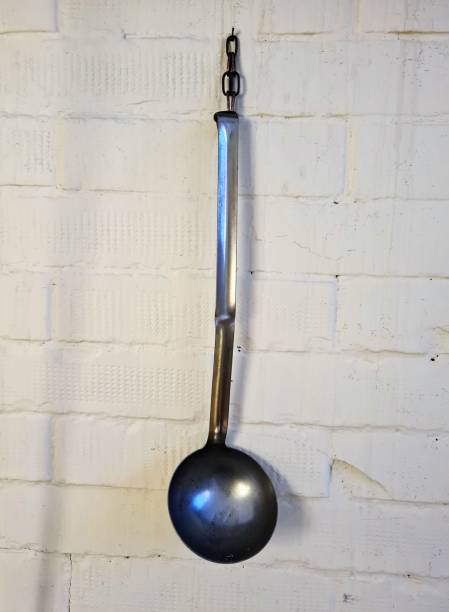 istock old ladle hanging on the wall 1532651110