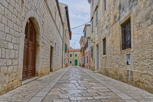 Classic typical back street historical in Porec in Croatia in Europe