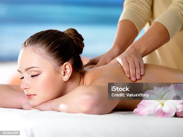 Spa Massage For Young Beautiful Woman Stock Photo - Download Image Now - Adult, Back, Beautiful People