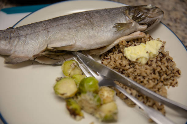 gefüllte rainbow trout - brusselsprouts stock-fotos und bilder