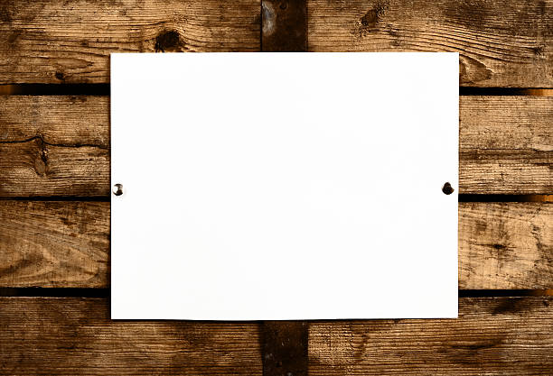 istock Blank paper on wooden wall 153267743