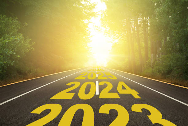 istock The word 2024 written on forest road 1532681858
