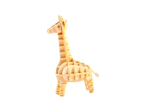 Miniature giraffe animal made of wood isolated on white