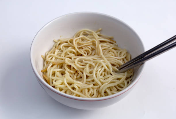 istock Plain instant noodles without topping in bowl isolated on white background with chopstick. Asian and Chinese style fast food concept. 1532721335