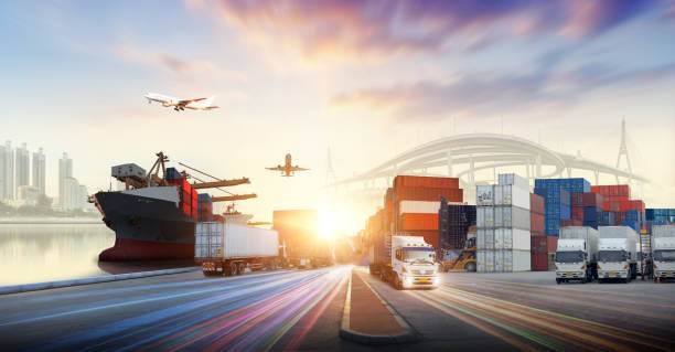 istock Logistics and transportation of Container Cargo ship and Cargo plane with working crane bridge in shipyard at sunrise, logistic import export and transport industry background 1532741038