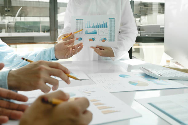 istock Team work process. Young business managers crew working with new startup project. 1532747494