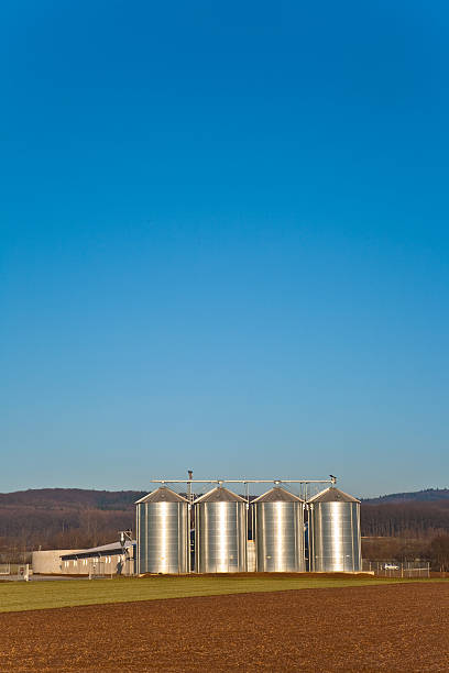 istock beautiful landscape with silo, acre and blue sky 153275698
