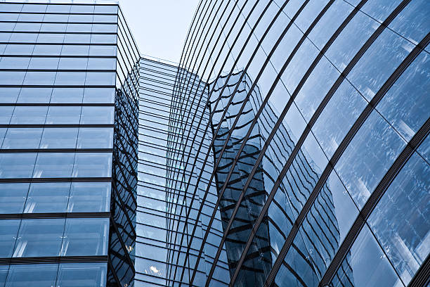 istock glass front of office tower 153275712