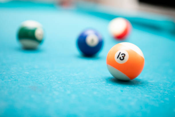 istock Pool balls on a turquoise coloured pool table 1532758205