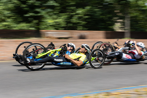 Parma, Italy - june 2022: Group of Athletes with Their Special  Bikes on a City Track in a Race.