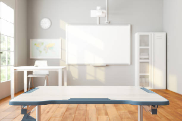 istock Close-up View Of Empty Desk In Modern Classroom With Blurred Background 1532770790