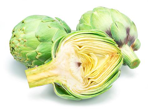 Green french artichoke and artichoke slices isolated on white background.