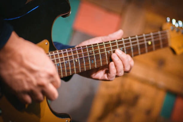 istock He plays a electric guitar. 1532814978