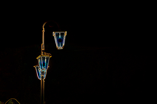 Abstract street lights in the darkness