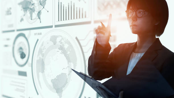 istock Young asian woman watching hologram display. 1532848124