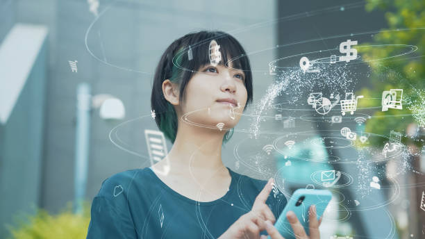 istock Young asian woman using a smart phone. Communication network. Internet of Things. 1532849692