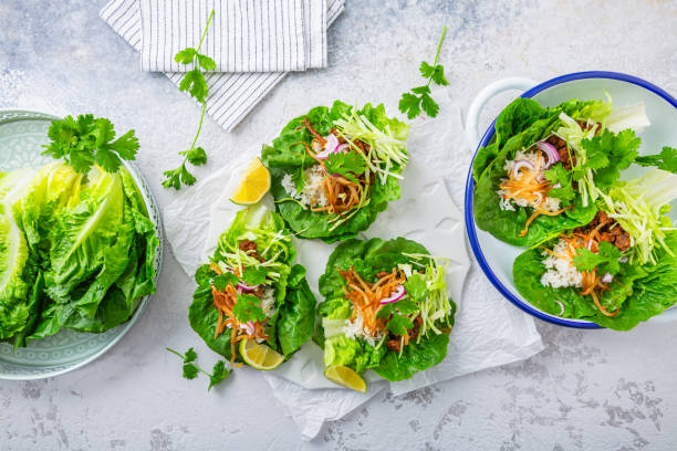 istock Asian minced meat lettuce wraps with rice, bean sprouts and cabbage 1532870978