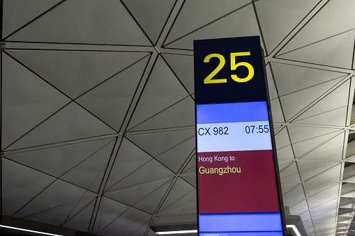 Hong Kong - June 27, 2023 : Departure gate for flight operated by Cathay Pacific to Guangzhou at Hong Kong International Airport.