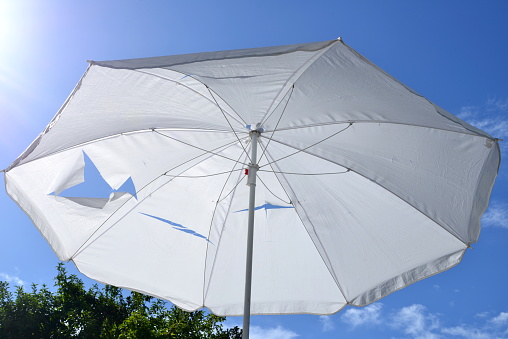 View of wide shadow tent in cottage.