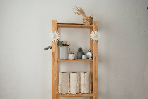 istock Wooden shelf with flowers and with rolls 1532887952