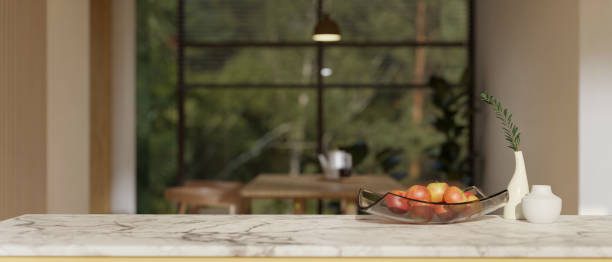 istock An apple bowl, minimal ceramic vases, and copy space on a white marble kitchen tabletop 1532954160
