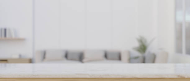 istock Empty mockup space on a tabletop with a blurred comfortable living room as a background 1532954733