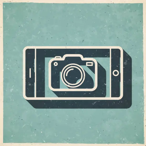 Vector illustration of Smartphone with camera. Icon in retro vintage style - Old textured paper