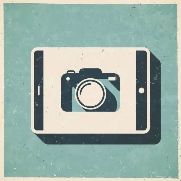 Vector illustration of Tablet PC with camera. Icon in retro vintage style - Old textured paper