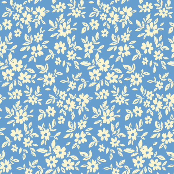 Seamless floral pattern with small sketch plants: white flowers, leaves on a blue background. Vector illustration. Seamless floral pattern, liberty ditsy print with pretty sketch botany. Artistic botanical design: small hand drawn white flowers, tiny leaves on a blue background. Vector illustration in two colors. cute simple drawings pictures stock illustrations