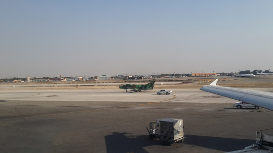 Hargeisa, Somaliland, Somalia: UN World Food Program Beechcraft 1900D (5Y-BVX) parked at Hargeisa Egal International Airport - hangar in the background.